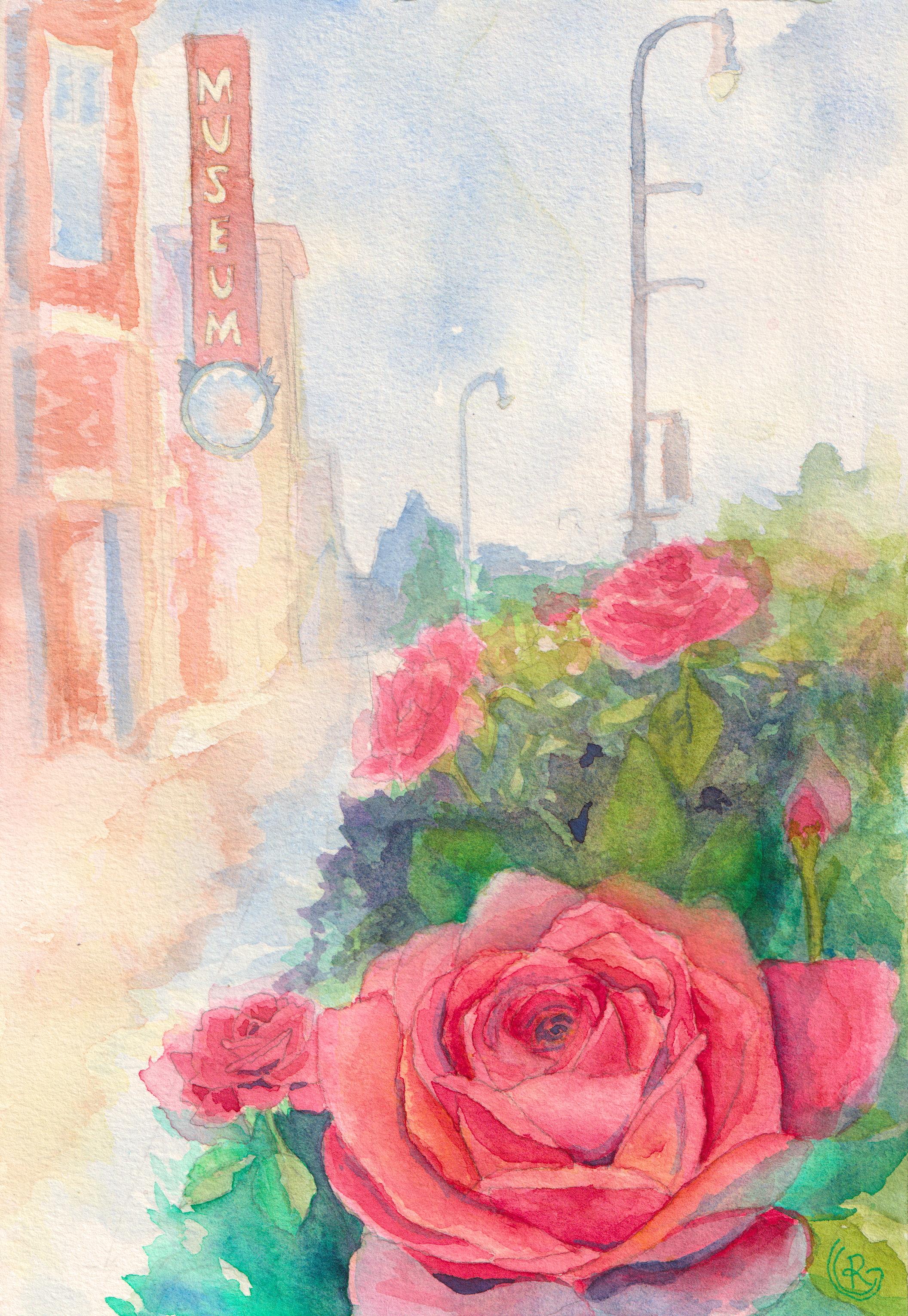Pinkish red rose against a misty memory of Main Street in Broken Arrow